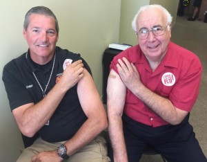 Estero Fire Chief Scott Vanderbrook (left) and Mayor Nick Batos remind residents it's time for your flu shot.